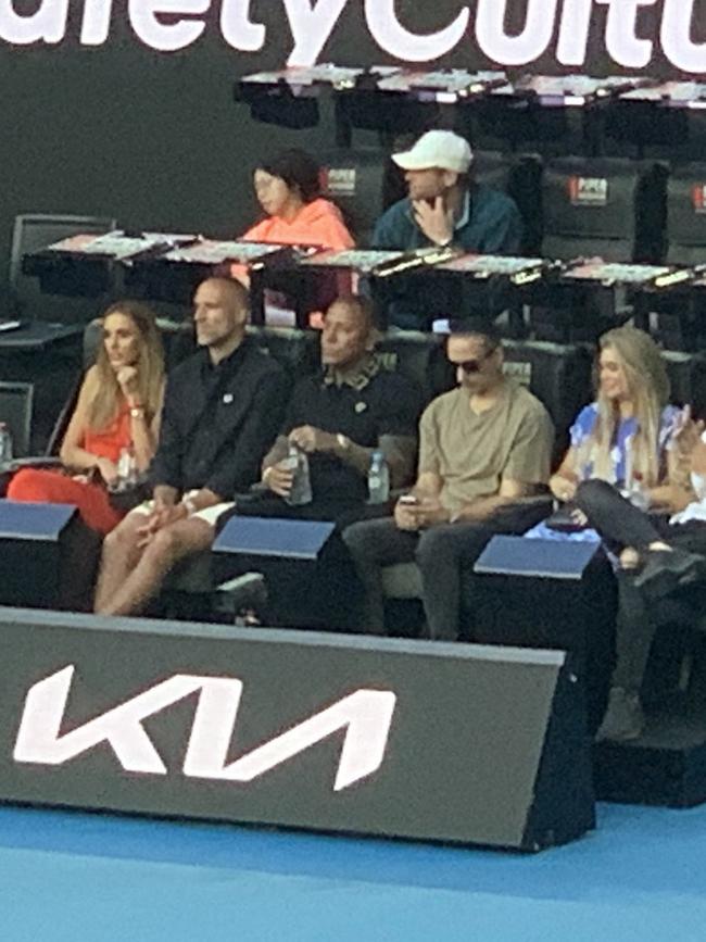 Bec and Chris Judd sit courtside at the Australian Open.