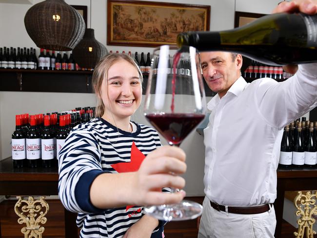 Jon Hamra onwer of Hula Cellars part of Hula Hoop at Kensington Park  serves Lucy Sullivan a glass of Tim Smith Wines Barossa M.G.S Thursday May 28 ,2020.Picture Mark Brake