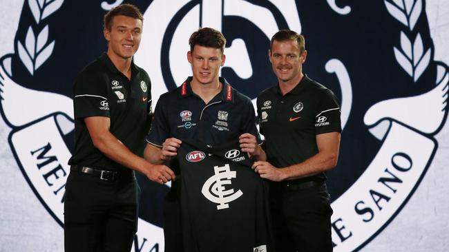 No.1 pick Sam Walsh with Blues co-captains Patrick Cripps and Sam Docherty. Picture: Michael Klein