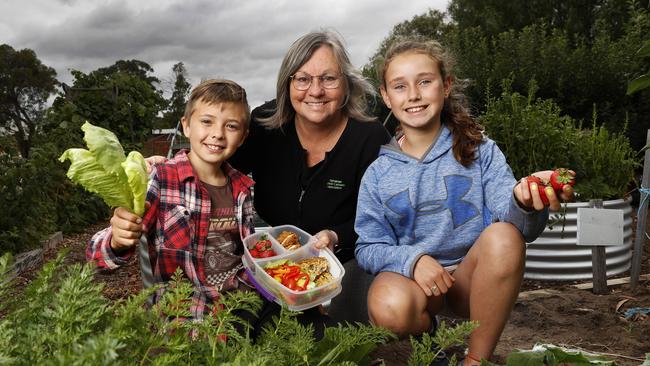 Tasmanian Schools Canteen Association executive officer Julie Dunbabin with Grade 5 students Henry Strutt, 10, and Ebony Scott, 10, at Richmond Primary School, which trialled a free lunch program for students in term 4 last year. Picture: Zak Simmonds