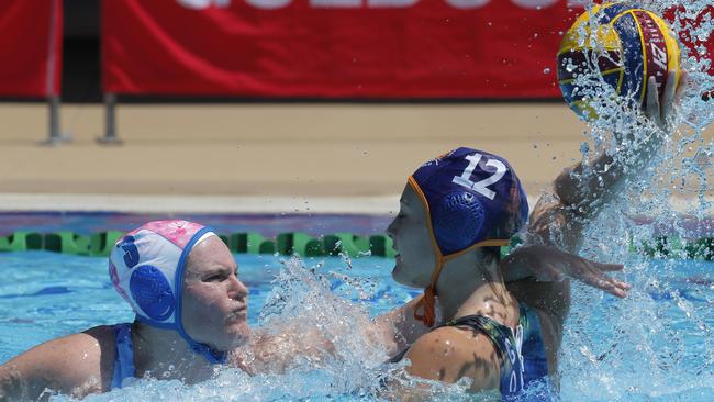 Matilda Moore put pressure on Gold Coast’s Grace Artley. Photo: Regi Varghese