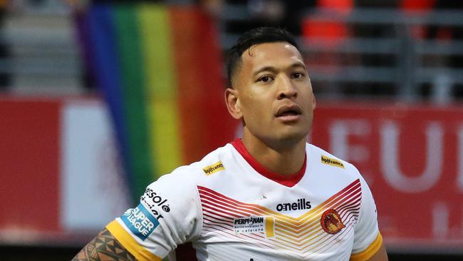 NEWS 360 PREMIUM LOCKED CONTENT – NO THE AUSTRALIAN/NO NEWS.COM/NO SKY NEWS/NO THE WESTERN AUSTRALIAN. Israel Folau plays his first rugby super league game with The Catalan Dragons against the Castleford Tigers in Perpignan, France and people in the background hanged a rainbow flag. Picture: Ella Pellegrini