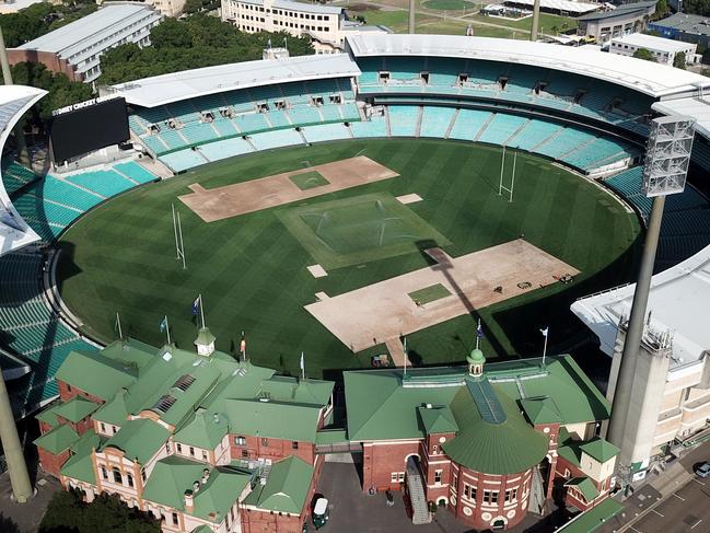 Work is carried out to re-turf sections of the SCG after it was damaged from a rugby game. 