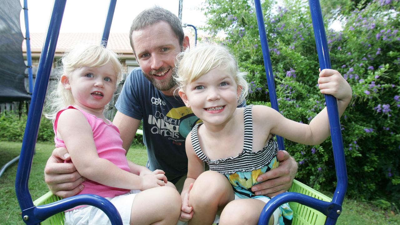 Anthony Petrie with daughters Emma, 2 (left), and Jessica, 4, in 2010. Picture: File