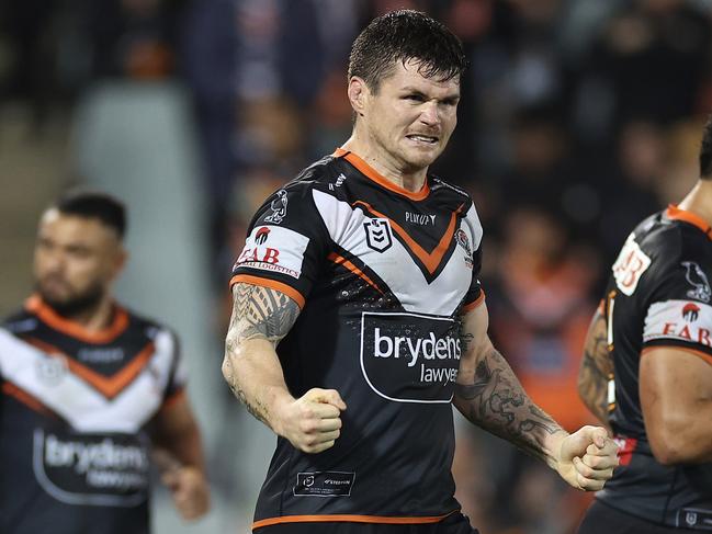 SYDNEY, AUSTRALIA - JUNE 02:  John Bateman of the Tigers celebrates after a Tigers try during the round 14 NRL match between Wests Tigers and Canberra Raiders at Campbelltown Stadium on June 02, 2023 in Sydney, Australia. (Photo by Cameron Spencer/Getty Images)