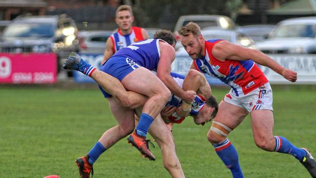 Sunbury and East Point players battle for the ball. Picture: Aaron Cook