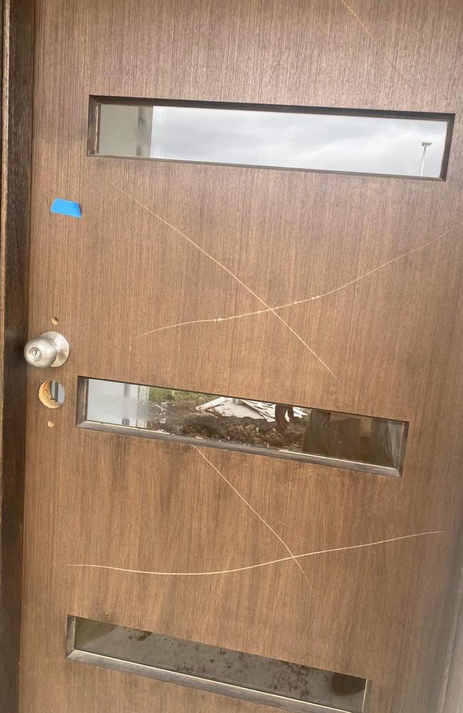 Doors and walls were scratched with a knife. Picture: Herald Sun