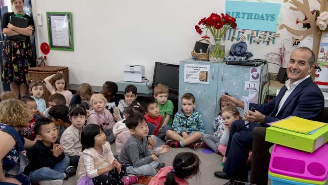 Deputy Premier and Minister for Education James Merlino visited the kinder to launch the program. Picture: Andy Brownbill