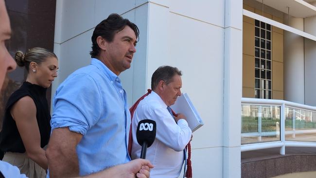 Outback Wrangler Matt Wright leaving the Supreme Court of the Northern Territory at Darwin on October 24, 2024, alongside his wife Kaia and his barrister David Edwardson. Picture: Zizi Averill