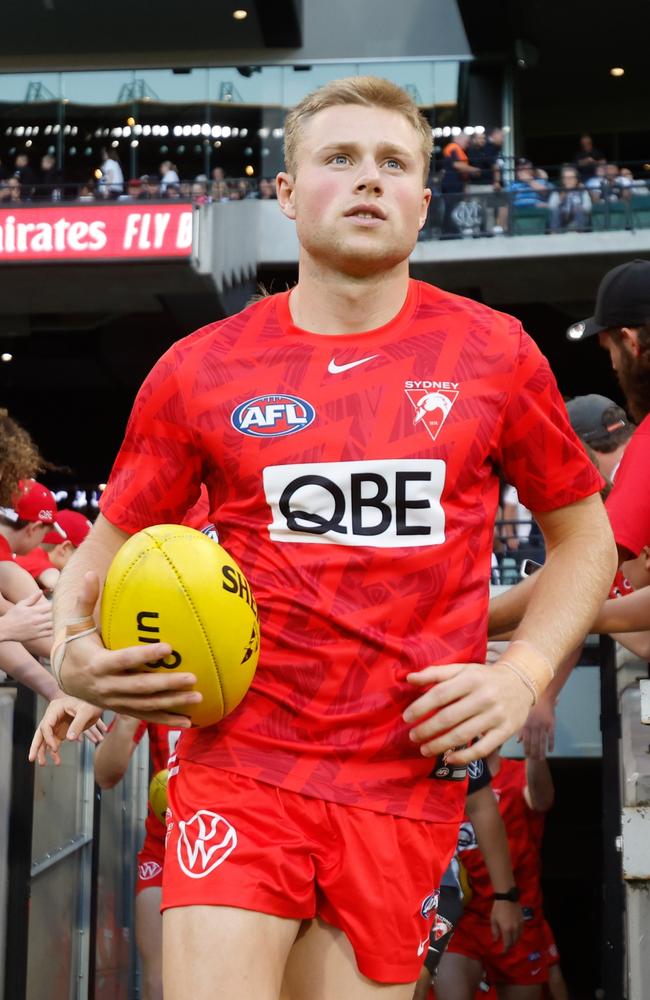 Braeden Campbell warms up in Round 1 at the MCG against Collingwood. Picture: Dylan Burns/AFL Photos via Getty Images.