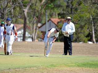 Caleb King bowls in the reserve-grade preliminary final at Mayhew Oval. James Kurtz, who made 26, in backing up at the bowler's end. Picture: Gerard Walsh