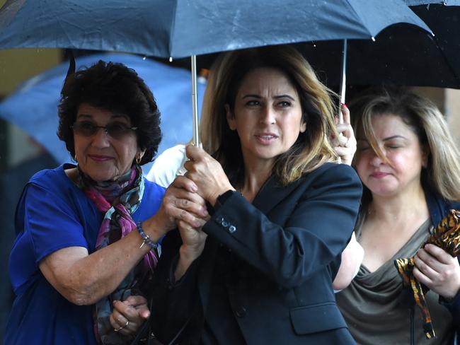 Eddie Obeid’s wife Judith with friends and family enter the Supreme Darlinghurst court for his sentencing. Picture: Adam Yip