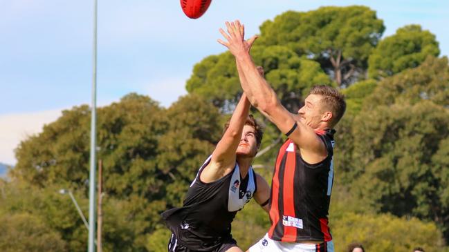 Craig Holm (right) had a strong 2021 but has retired from the Adelaide Footy League ahead of season 2022. Picture: Brayden Goldspink