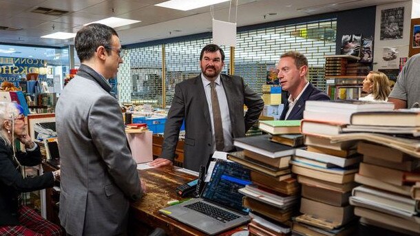 Owner of O'Connell's Bookshop, Ben O'Connell with Opposition leader David Speirs (right) and Shadow Police Minister, Sam Telfer.