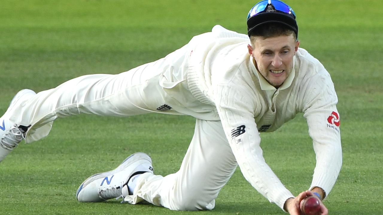 England captain Joe Root dives to catch replacement batsman Marnus Labuschagne.