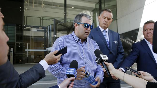 Ben Giggins, the victim of Graeme Lawrence, talks to media outside Newcastle District Court. Picture: Darren Pateman