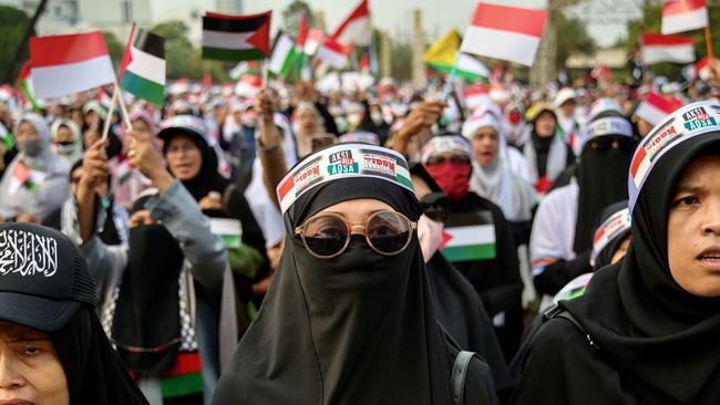 Indonesians chant at a fundraiser for the Palestinian cause on Sunday. Picture: AFP