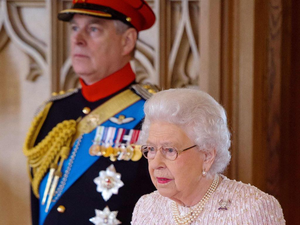 Britain's Queen Elizabeth II (R) and Britain's Prince Andrew, Duke of York before allegations of his paedophilia came to light. Picture: Getty Images