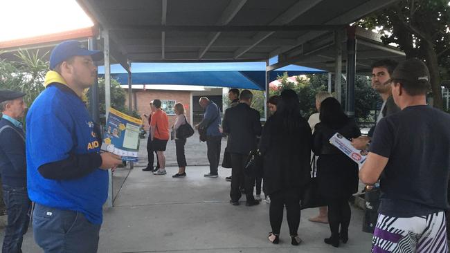 Long queue at Robina State High School at 4.45pm. Photo: Lea Emery