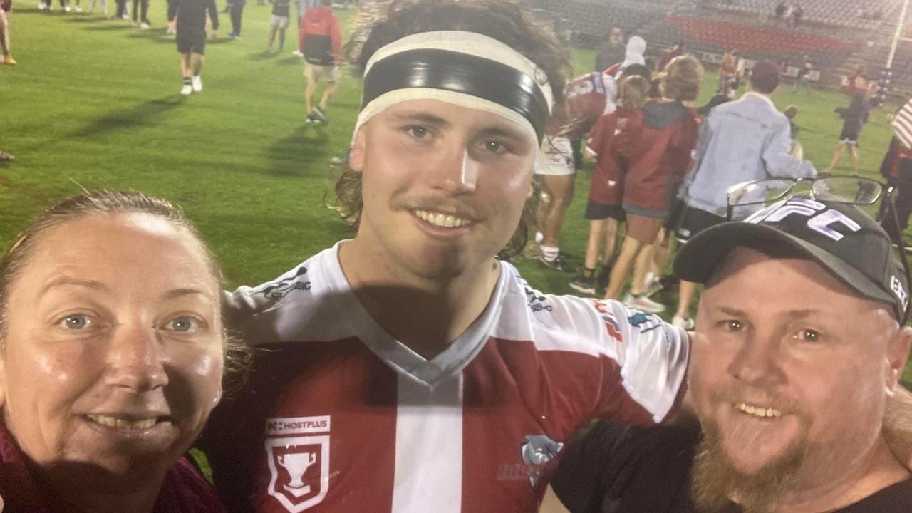 Liam Hampson (middle) with his mum Jamie Hampson (left), and dad Brett Hampson (right) after a game