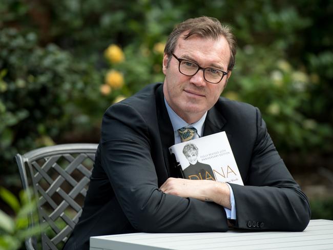 Royal biographer Andrew Morton poses with a copy of his book, “Diana: Her True Story — In Her Own Words”, the only authorised biography of the late princess. Photo: AFP/CHRIS J RATCLIFFE