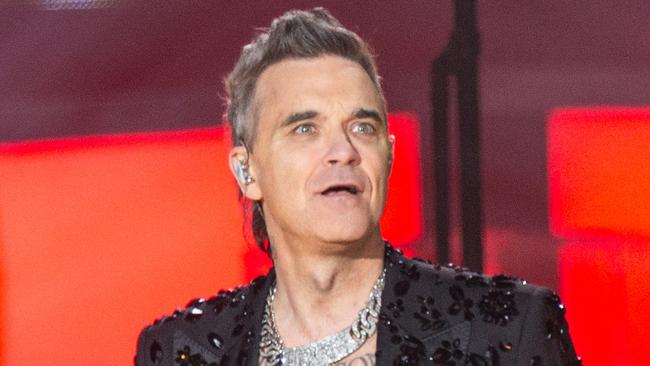 Robbie Williams performs onstage during his first of two shows in Melbourne at AAMI Park on Wednesday, November 22, 2023. Picture: Brett Schewitz