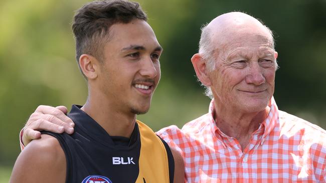 Kevin Bartlett throws a legendary arm over his heir apparent. Picture: Wayne Ludbey