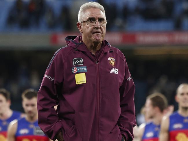 MELBOURNE, AUSTRALIA - AUGUST 17: Chris Fagan, Senior Coach of the Lions and his team look dejected after during the round 23 AFL match between Collingwood Magpies and Brisbane Lions at Melbourne Cricket Ground, on August 17, 2024, in Melbourne, Australia. (Photo by Daniel Pockett/Getty Images)