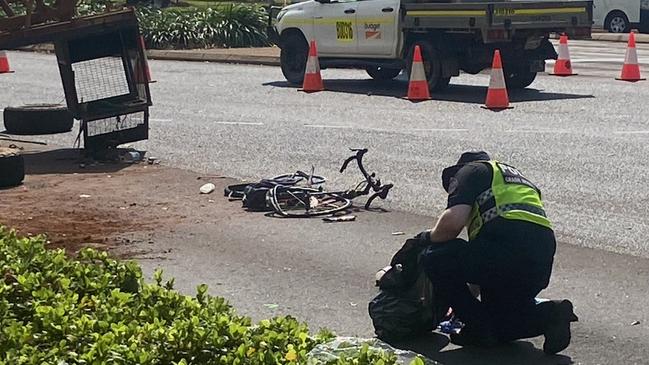 Investigators at the scene of Friday morning’s hit-and-run.