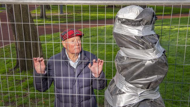 Rob Selkirk who is the president of the friends of the Ballarat Botanical gardens next to the vandalised statue of Tony Abbot. Picture: Rob Leeson.