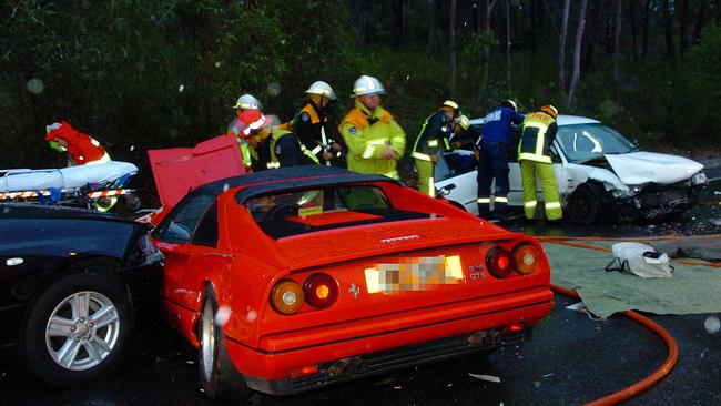 A head-on road crash on Mona Vale Rd on a two-lane section of road at Ingleside in 2006. The upgrade of the road, with a central crash barrier would make the road safer, planners say. Picture: John Grainger