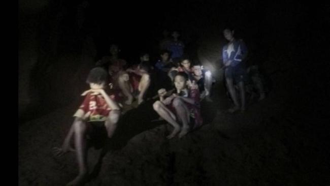 The group of Thai soccer players and their coach as they were found in a partially flooded cave in Mae Sai, Chiang Rai province, northern Thailand. Picture: Tham Luang Rescue Operation Center / AP