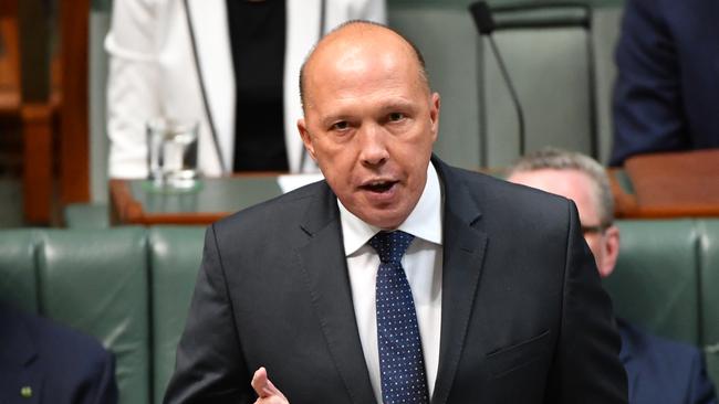 Minister for Home Affairs Peter Dutton during Question Time in the House of Representatives at Parliament House in Canberra, Wednesday, February 13, 2019. (AAP Image/Mick Tsikas) NO ARCHIVING