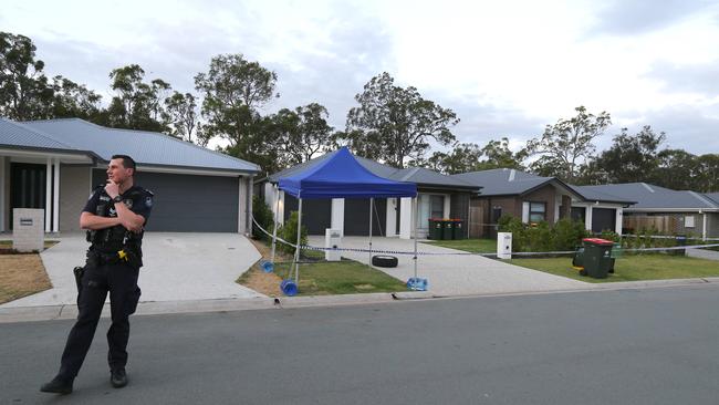 A crime scene has been established after a body was found during a welfare check to 10A and 10B Pierro Street, Logan Reserve Saturday 17th December 2022. Picture: David Clark