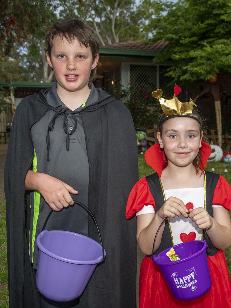 Caleb Wood and Aria Tomkinson visit the Halloween display of Tiffany Crosbie. Monday, October 31, 2022. Picture: Nev Madsen.