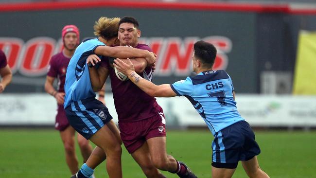 Action from the Australian state schools national rugby league championship match between Queensland Maroon and NSW CHS. Lui Lee. Picture: Tertius Pickard