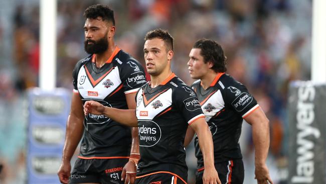 SYDNEY, AUSTRALIA - APRIL 05: Luke Brooks of the Tigers looks on after an Eels try during the round four NRL match between the Wests Tigers and the Parramatta Eels at Stadium Australia on April 05, 2021, in Sydney, Australia. (Photo by Mark Metcalfe/Getty Images)