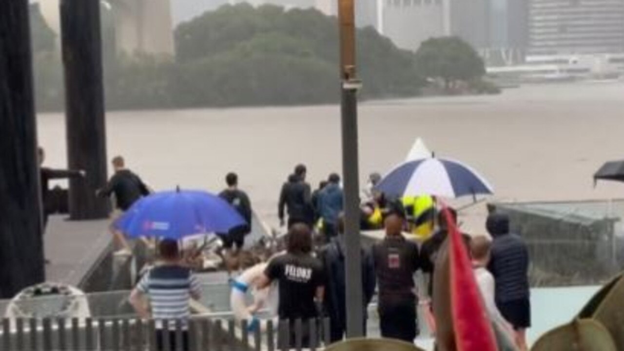 An incredible rescue of a man stuck under a pontoon at the Howard Smith Wharves ferry stop. Picture: Matthew Toomey/Twitter