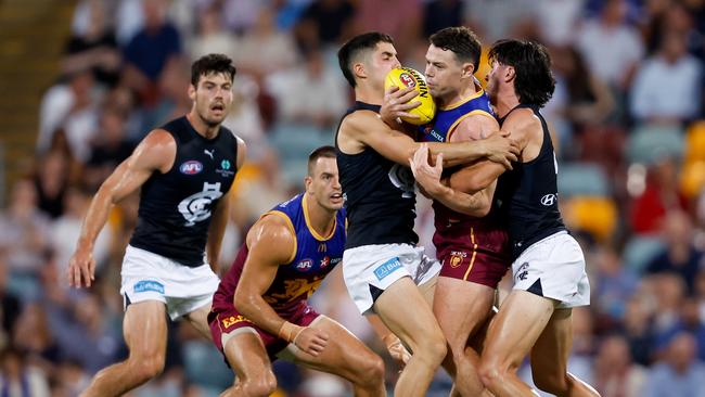 George Hewett (left) and Lachie Neale have avoided suspension. Picture: Dylan Burns/AFL Photos via Getty Images