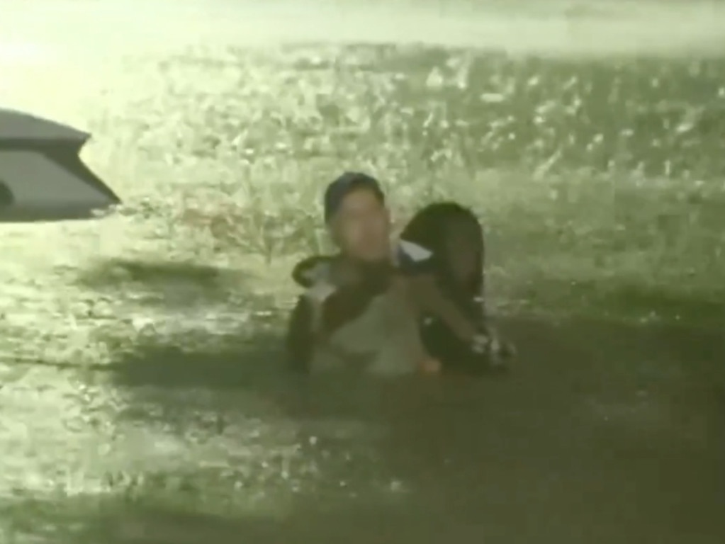 Fox Weather meteorologist Bob Van Dillen was filmed wading towards the woman who was screaming for help after driving into floodwater caused by Hurricane Helene. Picture: Fox News