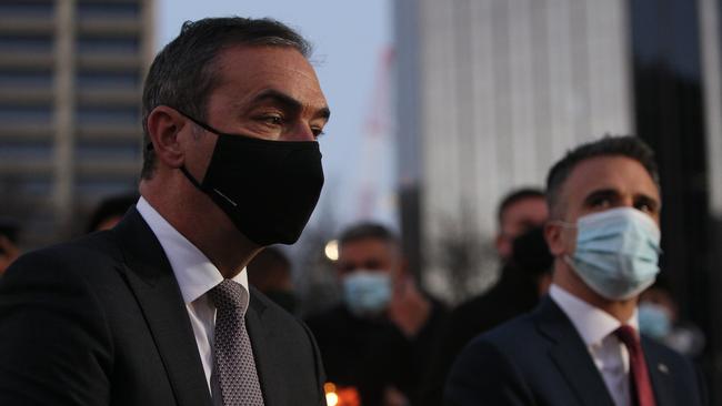 Premier Steven Marshall and Labor Leader Peter Malinauskas at a candle light vigil on August 21 in Victoria Square to show solidarity with the people of Afghanistan. Picture: Emma Brasier