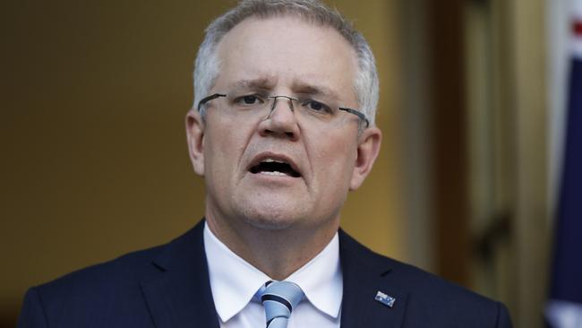 Australian Prime Minister Scott Morrison wearing an Australian flag pin. Picture: Sean Davey