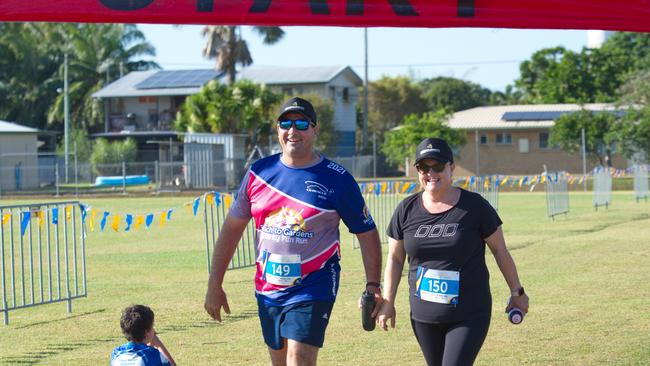 Brendan and Janine Refalo finish together in the 5km Run for MI Life on a perfect morning in Walkerston. October 17, 2021 Picture: Marty Strecker