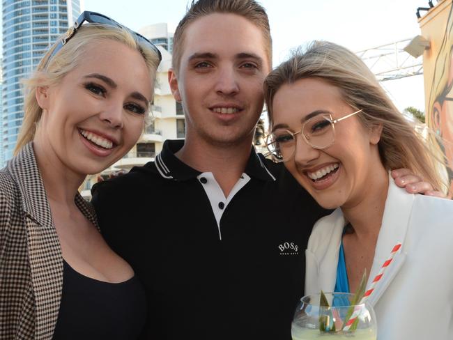 Brooke McNaughton, Mitchell Rolfe and Ashleigh Phelan at the opening of Cali Beach Club, Surfers Paradise. Picture: Regina King (copyright restrictions apply 07 55322193). "FEES APPLY, ONE TIME USE, NO ON-SELL OR ON-PASS". Pic for The Inside Word Peter and Regina Column GC Bulletin ONE TIME USE ONLY. Please call for permission to use.