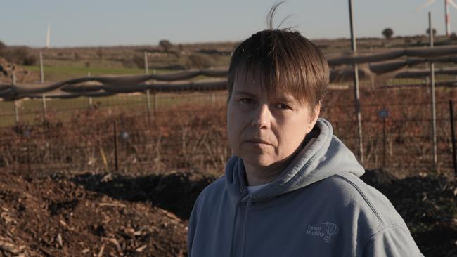 Melbourne mother Tania Borodach stands near the gate of the kibbutz at her home in El-Rom, in the Golan Heights near the Israel and Lebanon borders. Picture: Alon Farago