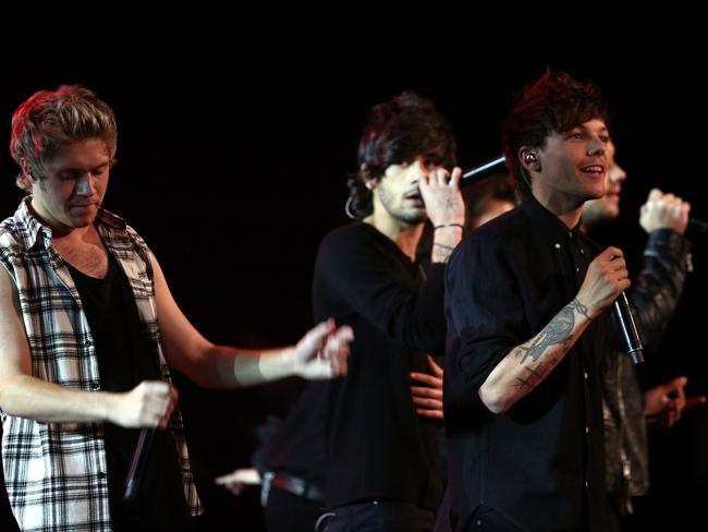 Pleased the fans...The One Direction boys performing on stage during the ARIA Awards. Picture: Cameron Spencer/Getty Images