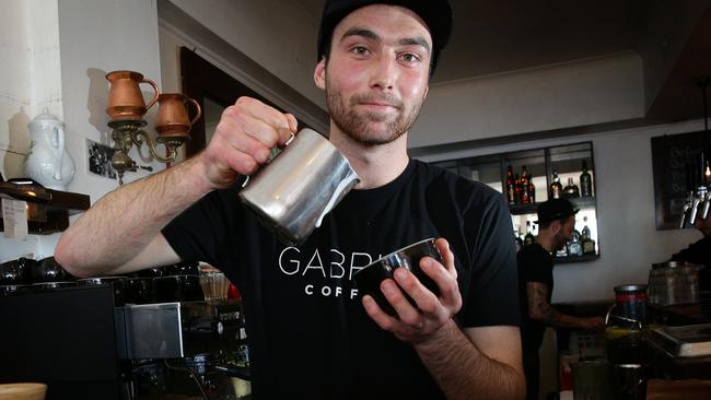 Manly cafe - Hemingway's is on Yelp's latest top 100 best latte list in Australia. Head barista Alex Wearne making a coffee.