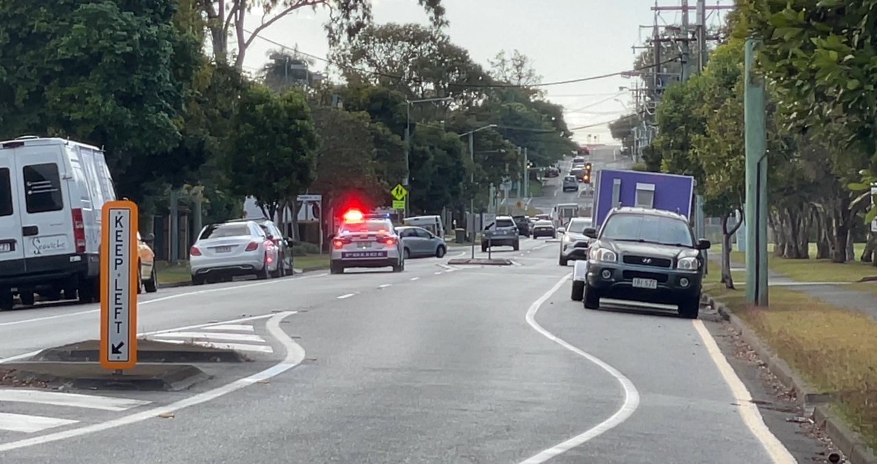 Police hunt armed men at Burleigh Heads