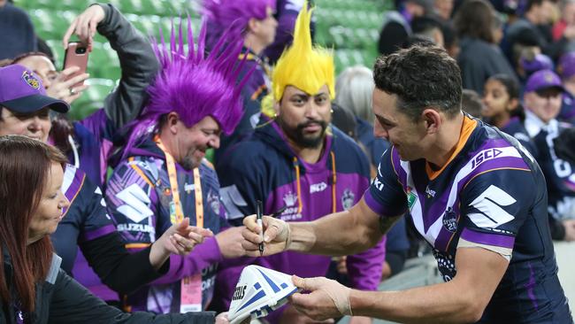 All in a day’s work for Billy, good luck trying to count the number autographs and selfies taken over the past 16 seasons. Picture: AAP