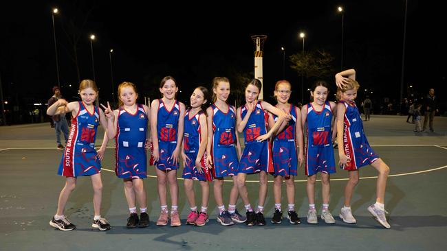 South Barwon Red under-11 netball team pull their funniest faces.